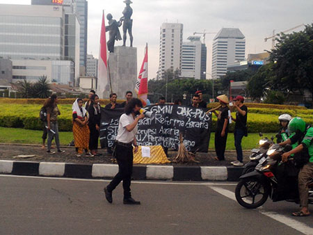 Aktivis GMNI Jakpus gelar aksi repleksi Hari Tani Nasional di Tugu Tani, Jakarta. Dok. GMNI